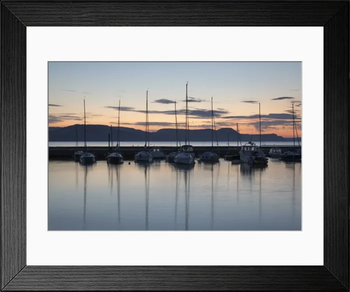 Framed Print : Yachts moored in The Cobb with Jurassic Coast and Golden Cap at sunrise, Lyme Regis Framed Print : Yachts moored in The Cobb with Jurassic Coast and Golden Cap at sunrise, Lyme Regis