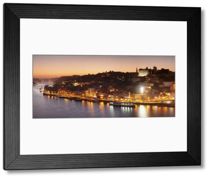 Framed Print : View over Douro River at sunset to Ribeira District, UNESCO World Heritage Site, Porto (Oporto) Framed Print : View over Douro River at sunset to Ribeira District, UNESCO World Heritage Site, Porto (Oporto)