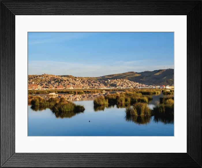 Framed Print : Lake Titicaca and cityscape of Puno at sunrise, Peru, South America Framed Print : Lake Titicaca and cityscape of Puno at sunrise, Peru, South America