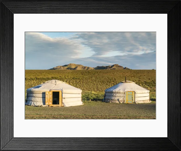 Framed Print : Two Mongolian nomadic gers and mountains in the background, Bayandalai district Framed Print : Two Mongolian nomadic gers and mountains in the background, Bayandalai district