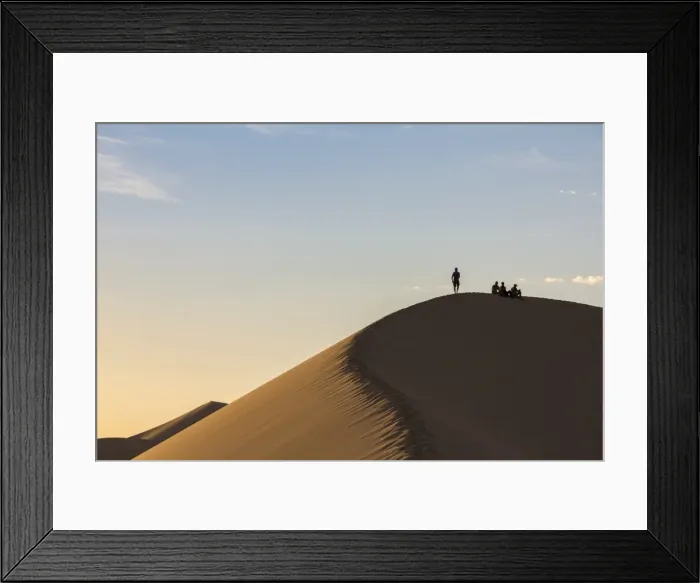 Framed Print : People in silhouette on Khongor sand dunes in Gobi Gurvan Saikhan National Park, Sevrei district Framed Print : People in silhouette on Khongor sand dunes in Gobi Gurvan Saikhan National Park, Sevrei district