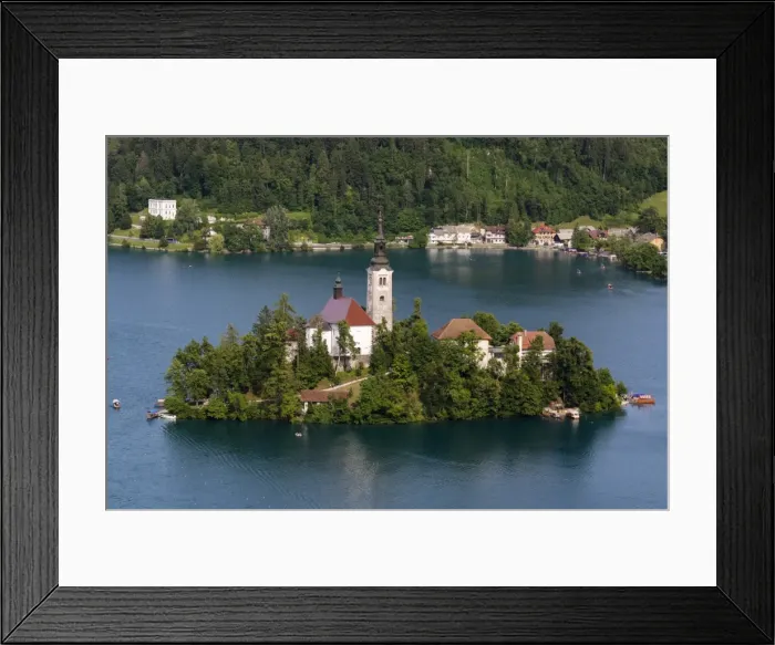Framed Print : A view from above of Lake Bled and the Assumption of Mary Pilgrimage Church, Slovenia Framed Print : A view from above of Lake Bled and the Assumption of Mary Pilgrimage Church, Slovenia