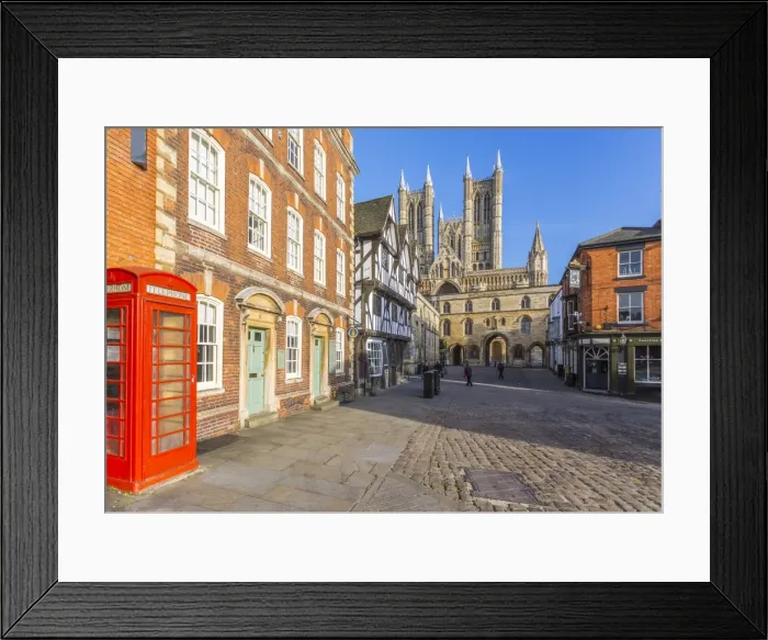 Framed Print : Lincoln Cathedral viewed from Exchequer Gate with red telephone visible, Lincoln