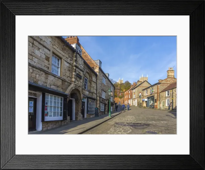Framed Print : Lincoln Cathedral viewed from the cobbled Steep Hill, Lincoln, Lincolnshire, England Framed Print : Lincoln Cathedral viewed from the cobbled Steep Hill, Lincoln, Lincolnshire, England