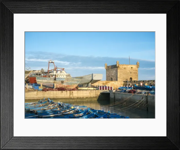 Framed Print : Skala du Port, 18th-century seafront ramparts and boats in the fishing port, Essaouira Framed Print : Skala du Port, 18th-century seafront ramparts and boats in the fishing port, Essaouira