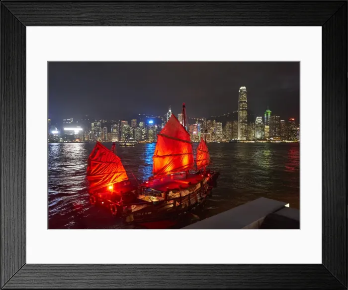 Framed Print : Traditional Chinese junk boat for tourists on Victoria Harbour illuminated at night Framed Print : Traditional Chinese junk boat for tourists on Victoria Harbour illuminated at night