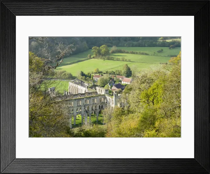 Framed Print : Rievaulx Abbey and remote village near Helmsley in North Yorkshire, England, United Kingdom Framed Print : Rievaulx Abbey and remote village near Helmsley in North Yorkshire, England, United Kingdom