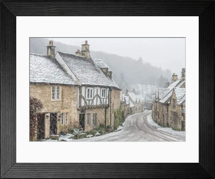 Framed Print : Looking down the quintessential English village of Castle Combe in the snow, Wiltshire