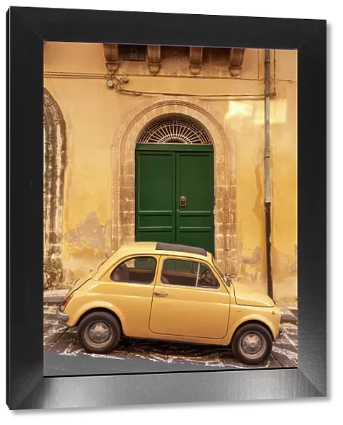 Old Fiat 500 parked in street, Noto, Sicily, Italy, Europe