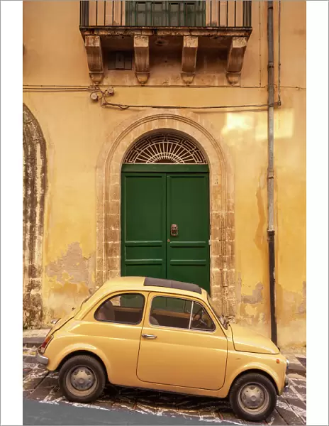 Old Fiat 500 parked in street, Noto, Sicily, Italy, Europe