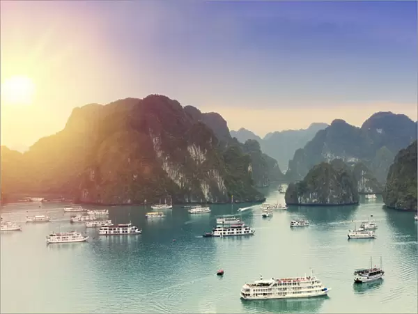 Boats on Halong Bay at sunset, UNESCO World Heritage Site, Vietnam, Indochina, Southeast Asia