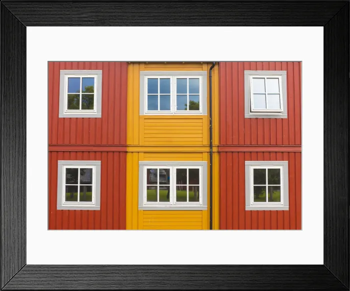 Framed Print : Details of facades and windows of typical wooden houses of fishermen in Svolvaer Framed Print : Details of facades and windows of typical wooden houses of fishermen in Svolvaer