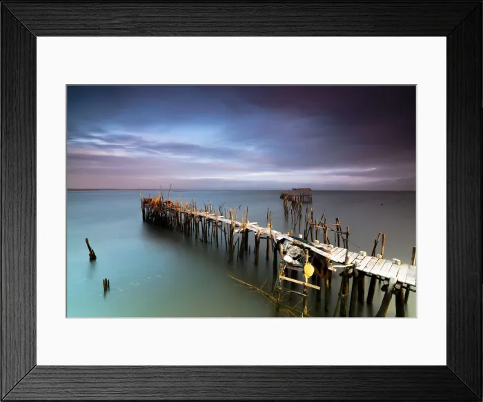 Framed Print : Sunrise and clouds on the Palafito Pier in the Carrasqueira Natural Reserve of Sado River Framed Print : Sunrise and clouds on the Palafito Pier in the Carrasqueira Natural Reserve of Sado River