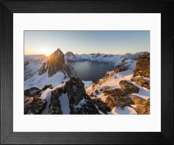 Framed Print : First light of sunrise on Mount Segla and Mefjorden framed by the frozen sea seen from peak Hesten Framed Print : First light of sunrise on Mount Segla and Mefjorden framed by the frozen sea seen from peak Hesten