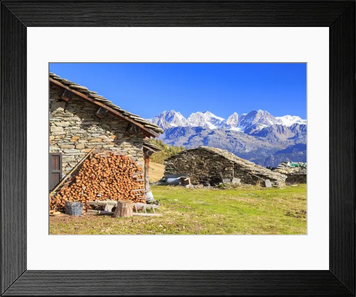 Framed Print : Alpine huts framed by snowy peaks of Bernina Group, Arcoglio Alp, Val Torreggio, Malenco Valley Framed Print : Alpine huts framed by snowy peaks of Bernina Group, Arcoglio Alp, Val Torreggio, Malenco Valley
