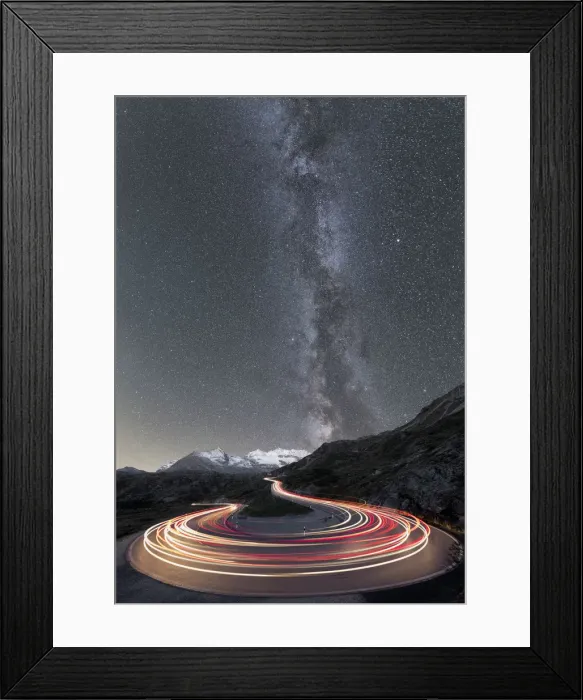 Framed Print : Milky Way and lights of car traces, Bernina Pass, Poschiavo Valley, Engadine, Canton of Graubunden Framed Print : Milky Way and lights of car traces, Bernina Pass, Poschiavo Valley, Engadine, Canton of Graubunden