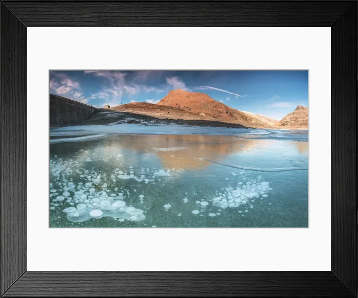 Framed Print : Panoramic of frozen lake Montespluga at dawn, Chiavenna Valley, Sondrio province Framed Print : Panoramic of frozen lake Montespluga at dawn, Chiavenna Valley, Sondrio province