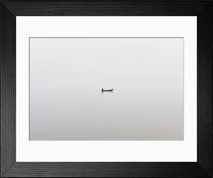 Framed Print : A fishing boat on a perfectly calm Indawgyi Lake in northern Myanmar on a misty afternoon Framed Print : A fishing boat on a perfectly calm Indawgyi Lake in northern Myanmar on a misty afternoon