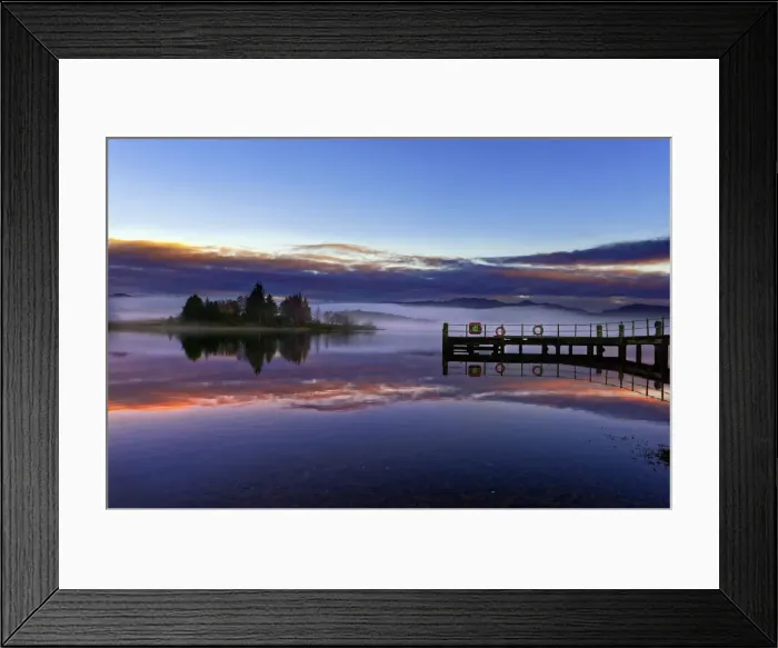 Framed Print : A tranquil view across the calm waters of Loch Shiel as dawn breaks on a misty winter morning Framed Print : A tranquil view across the calm waters of Loch Shiel as dawn breaks on a misty winter morning