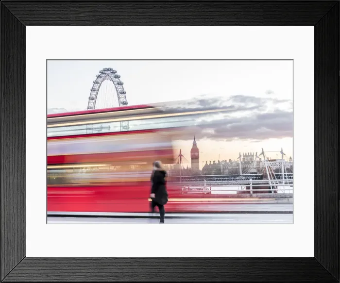 Framed Print : A lady crossing Waterloo Bridge with a bus passing between her, the London Eye and Big Ben Framed Print : A lady crossing Waterloo Bridge with a bus passing between her, the London Eye and Big Ben
