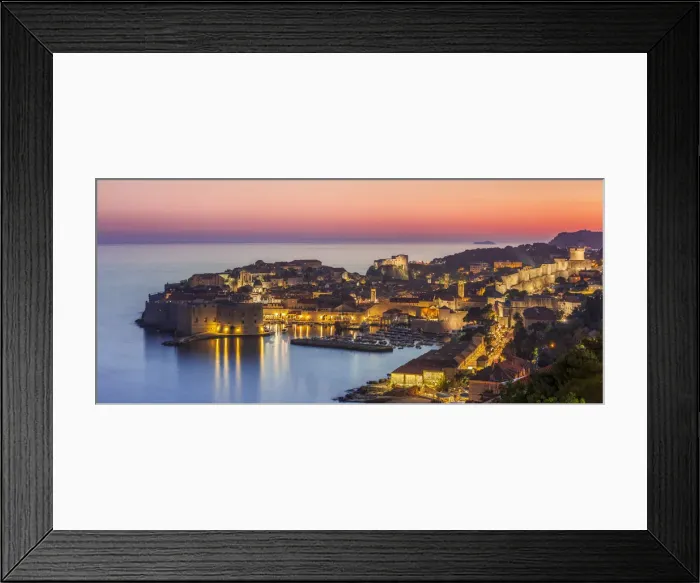 Framed Print : Aerial panorama of Dubrovnik Old Town at night with orange sunset sky, UNESCO World Heritage Site Framed Print : Aerial panorama of Dubrovnik Old Town at night with orange sunset sky, UNESCO World Heritage Site
