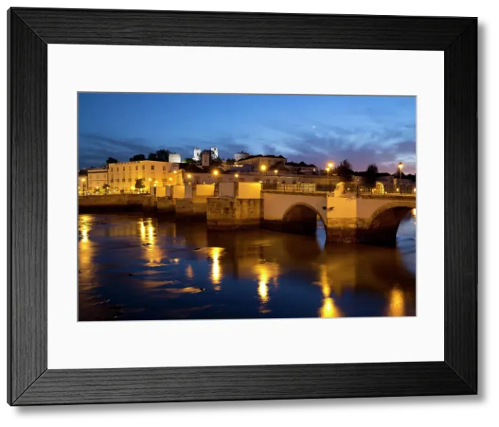 Framed Print : Seven arched Roman bridge and town on the Rio Gilao river at night, Tavira, Algarve Framed Print : Seven arched Roman bridge and town on the Rio Gilao river at night, Tavira, Algarve