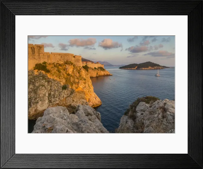 Framed Print : View to Lovrijenac Fortress (St. Lawrence Fortress), the city walls and Lokrum Island at sunset Framed Print : View to Lovrijenac Fortress (St. Lawrence Fortress), the city walls and Lokrum Island at sunset