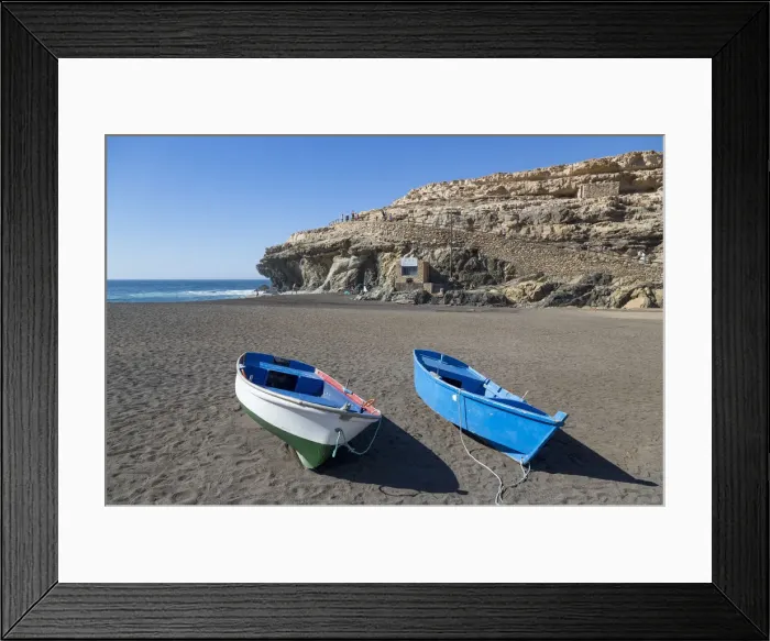 Framed Print : Small fishing boats on Playa Ajuy on the volcanic island of Fuerteventura, Canary Islands Framed Print : Small fishing boats on Playa Ajuy on the volcanic island of Fuerteventura, Canary Islands