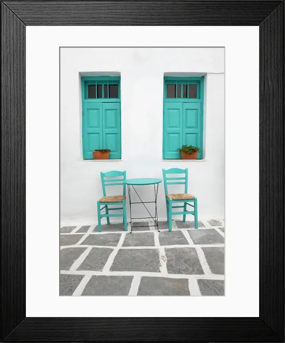 Framed Print : Typical Greek cafe table and chairs with shuttered windows, Pano Chora, Serifos, Cyclades