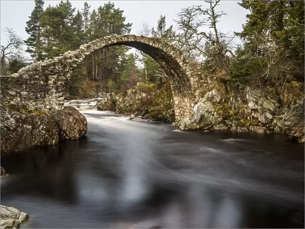 The old packhorse bridge built in 1717 over the River Dulnain in the village of Carrbridge