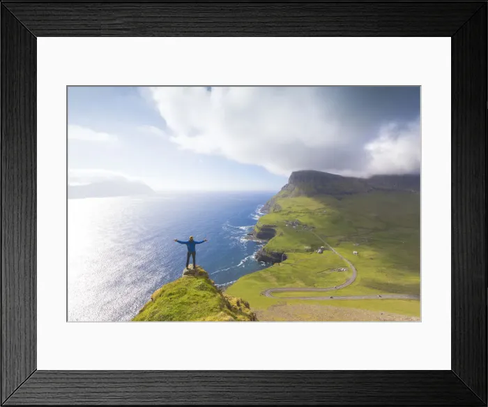 Framed Print : Hiker on top of rocks, Gasadalur, Vagar Island, Faroe Islands, Denmark, Europe Framed Print : Hiker on top of rocks, Gasadalur, Vagar Island, Faroe Islands, Denmark, Europe