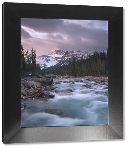 Sunrise and glacial blue rushing waters at Mistaya Canyon, Banff National Park, UNESCO