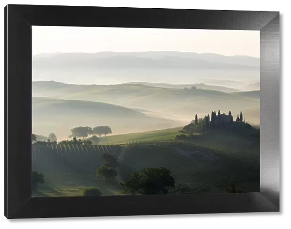 Podere Belvedere and misty hills at sunrise, Val d Orcia, San Quirico d Orcia, UNESCO