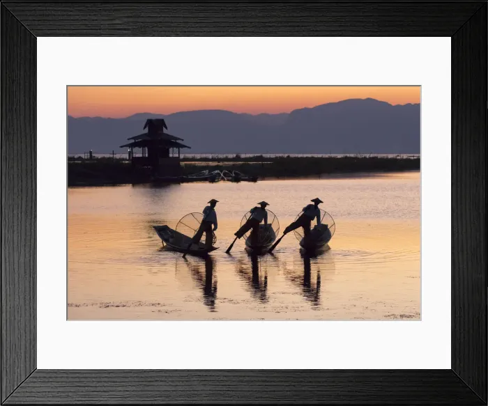 Framed Print : Three fishermen balance on one leg at sunset on Inle Lake, Shan State, Myanmar (Burma) Framed Print : Three fishermen balance on one leg at sunset on Inle Lake, Shan State, Myanmar (Burma)