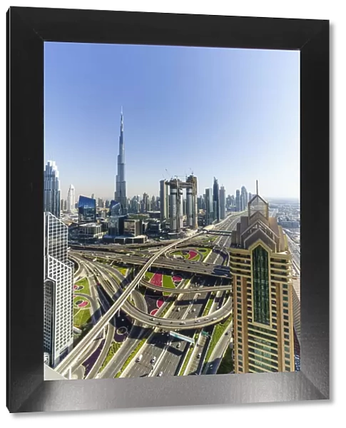 Dubai skyline and Sheikh Zayed Road Interchange, Dubai, United Arab Emirates, Middle East