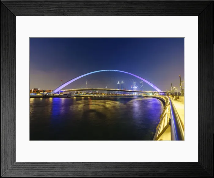 Framed Print : Tolerance Bridge, a pedestrian bridge spanning Dubai Water Canal illuminated at night Framed Print : Tolerance Bridge, a pedestrian bridge spanning Dubai Water Canal illuminated at night