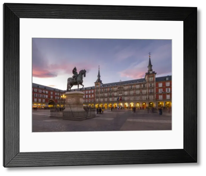 Framed Print : View of Philip lll statue and architecture in Calle Mayor at dusk, Madrid, Spain, Europe Framed Print : View of Philip lll statue and architecture in Calle Mayor at dusk, Madrid, Spain, Europe