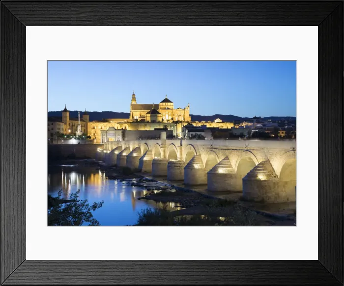 Framed Print : The Mezquita and Roman Bridge over the river Guadalquivir floodlit at night, Cordoba Framed Print : The Mezquita and Roman Bridge over the river Guadalquivir floodlit at night, Cordoba