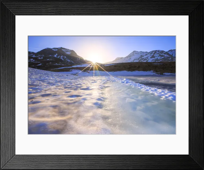 Framed Print : Sunburst on Lake Andossi during thaw, Chiavenna Valley, Spluga Valley, Sondrio province Framed Print : Sunburst on Lake Andossi during thaw, Chiavenna Valley, Spluga Valley, Sondrio province