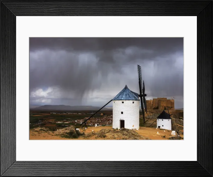 Framed Print : Storm clouds on windmills and castle, Consuegra, Don Quixote route, Toledo province Framed Print : Storm clouds on windmills and castle, Consuegra, Don Quixote route, Toledo province