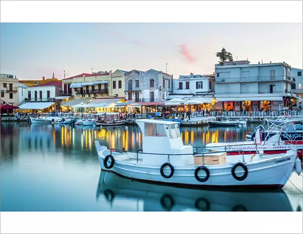 Old Venetian harbour, taverns on seaside at dusk, Rethymno (Rethymnon), Crete, Greek Islands