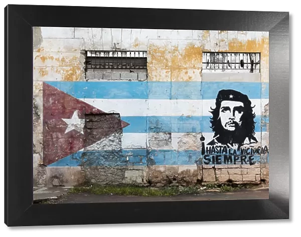 Painting of Che Guevara and Cuban flag on a wall, Havana, Cuba, West Indies, Caribbean