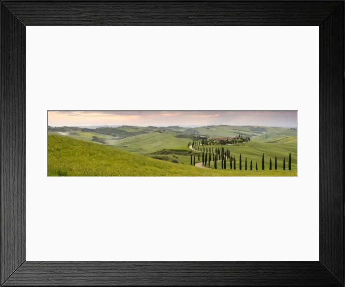 Framed Print : Panoramic view of sunset over the Agriturismo Baccoleno and winding path with cypress trees Framed Print : Panoramic view of sunset over the Agriturismo Baccoleno and winding path with cypress trees