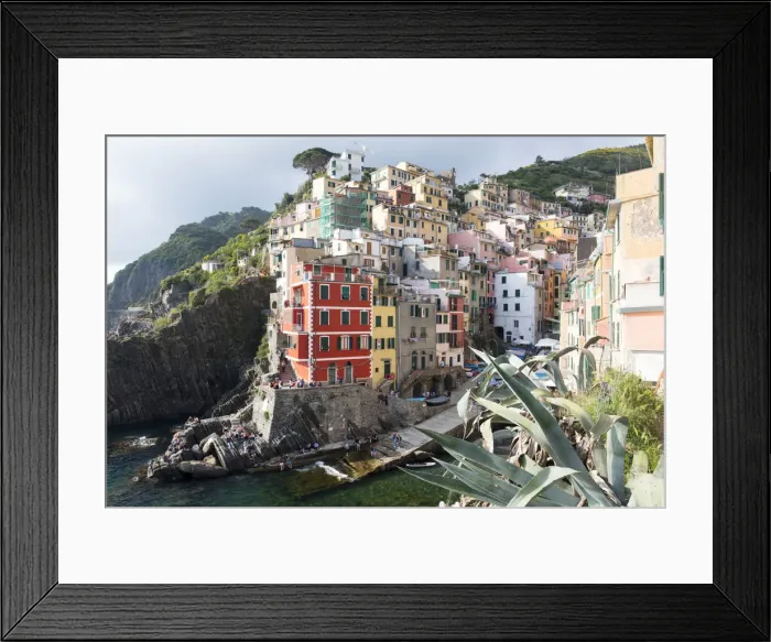 Framed Print : Colourful buildings by sea, Riomaggiore, Cinque Terre, UNESCO World Heritage Site Framed Print : Colourful buildings by sea, Riomaggiore, Cinque Terre, UNESCO World Heritage Site