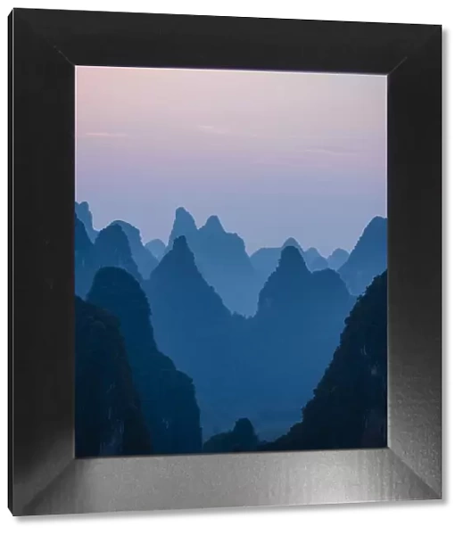 Sunset over Karst Hills from Lao Zhai, Xingping, Guilin, Guangxi Province, China, Asia