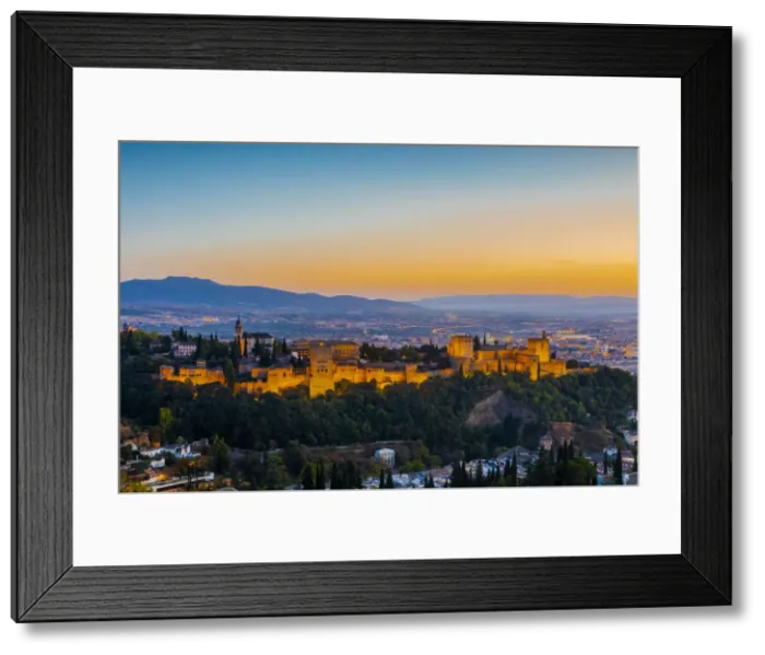 Framed Print : View of Alhambra, UNESCO World Heritage Site, and Sierra Nevada mountains at dusk Framed Print : View of Alhambra, UNESCO World Heritage Site, and Sierra Nevada mountains at dusk