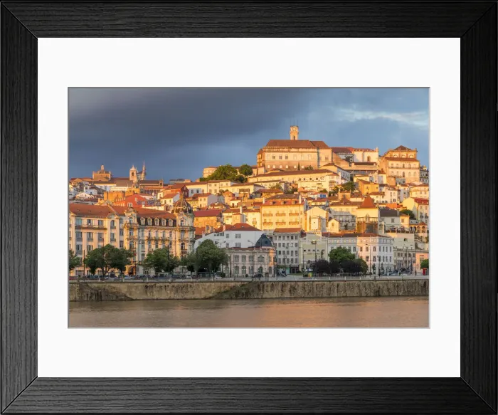 Framed Print : View from Mondego River to the old town with the university on top of the hill at sunset Framed Print : View from Mondego River to the old town with the university on top of the hill at sunset
