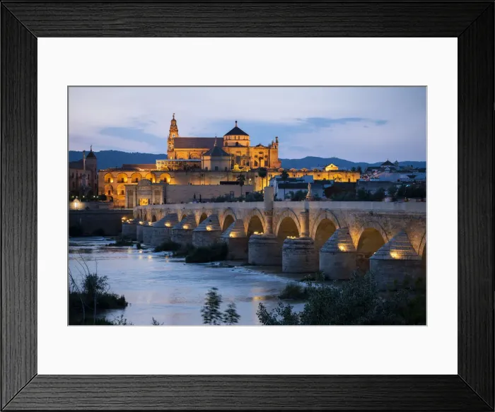 Framed Print : The Cathedral and Great Mosque of Cordoba (Mezquita) and Roman Bridge at twilight Framed Print : The Cathedral and Great Mosque of Cordoba (Mezquita) and Roman Bridge at twilight