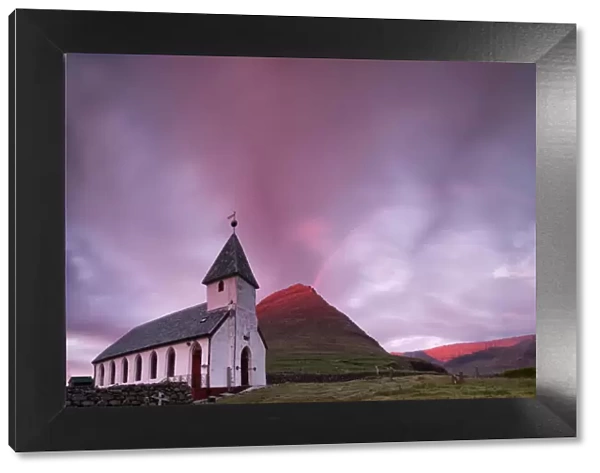 Panoramic of church of Vidareidi at sunrise, Vidoy island, Faroe Islands, Denmark, Europe