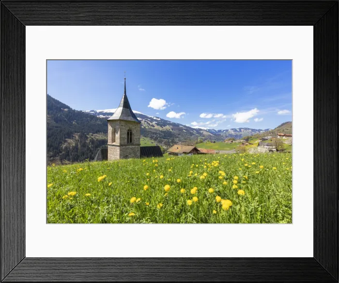 Framed Print : Bell tower surrounded by wildflowers and meadows in spring, Luzein, Prattigau-Davos region Framed Print : Bell tower surrounded by wildflowers and meadows in spring, Luzein, Prattigau-Davos region